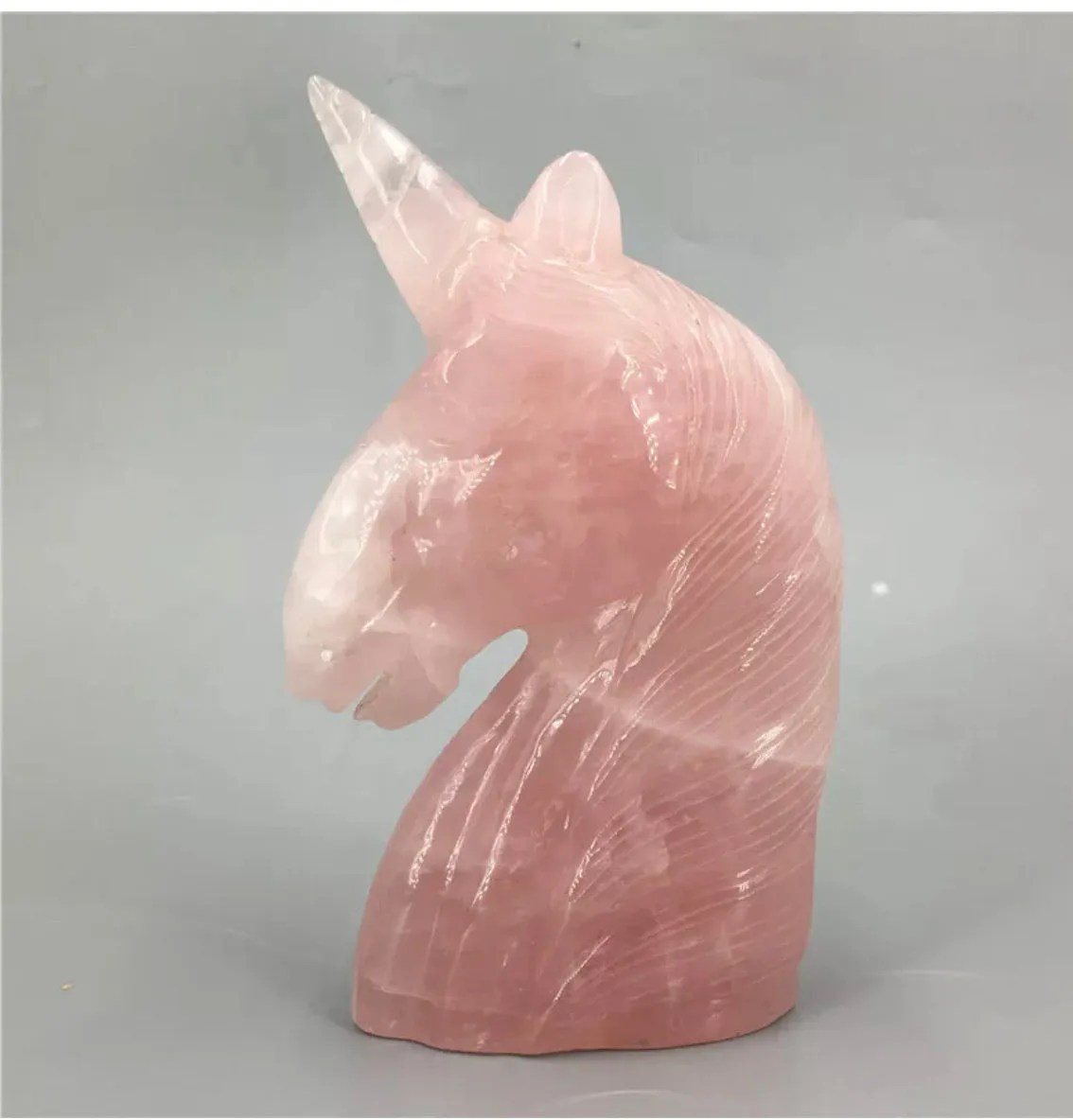 Natural Rose Quartz gemstone carved unicorn