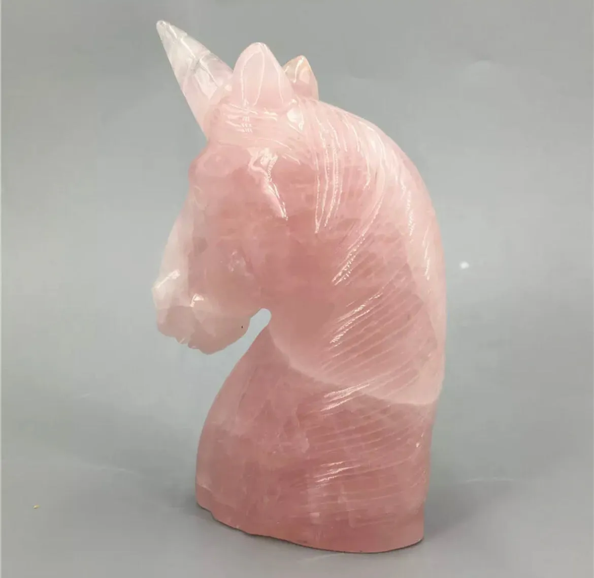 Natural Rose Quartz gemstone carved unicorn